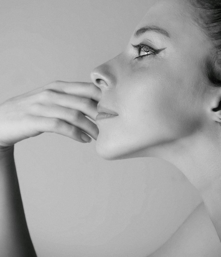 a black and white photo of a woman's face